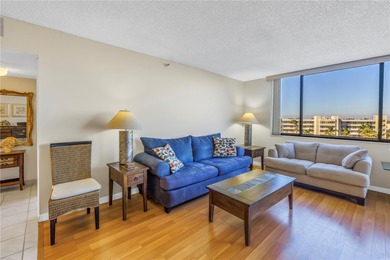 Move-in ready and fully furnished, this spacious 2-bed, 2-bath on Isla Del Sol Yacht and Country Club in Florida - for sale on GolfHomes.com, golf home, golf lot