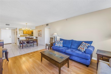 Move-in ready and fully furnished, this spacious 2-bed, 2-bath on Isla Del Sol Yacht and Country Club in Florida - for sale on GolfHomes.com, golf home, golf lot