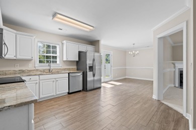 Welcome to this move-in ready, 4 bedroom, 3 bathroom home tucked on Shaftesbury Glen Golf and Fish Club in South Carolina - for sale on GolfHomes.com, golf home, golf lot