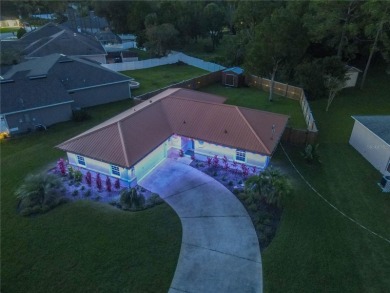 Welcome to this beautifully updated, move-in-ready home offering on The Grand Club - Pine Lakes Course in Florida - for sale on GolfHomes.com, golf home, golf lot