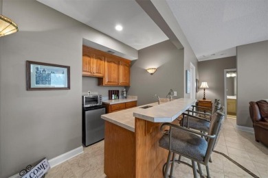 Welcome home to this wonderful reverse villa, a perfect blend of on Falcon Ridge Golf Course in Kansas - for sale on GolfHomes.com, golf home, golf lot