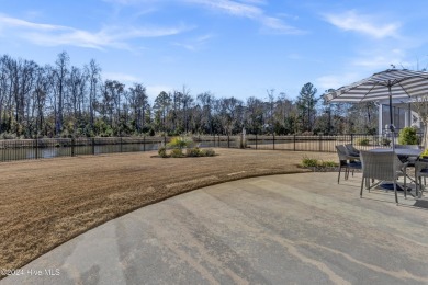 This impeccably maintained home, spanning over 2,900 square feet on Compass Pointe Golf Course in North Carolina - for sale on GolfHomes.com, golf home, golf lot