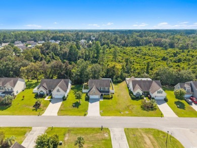Welcome to this move-in ready, 4 bedroom, 3 bathroom home tucked on Shaftesbury Glen Golf and Fish Club in South Carolina - for sale on GolfHomes.com, golf home, golf lot