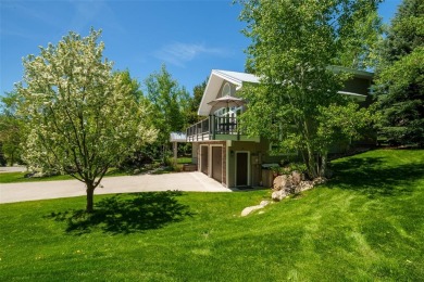 Bright and beautifully updated Steamboat Springs home just on Rollingstone Ranch Golf Club in Colorado - for sale on GolfHomes.com, golf home, golf lot