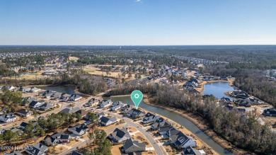 This impeccably maintained home, spanning over 2,900 square feet on Compass Pointe Golf Course in North Carolina - for sale on GolfHomes.com, golf home, golf lot