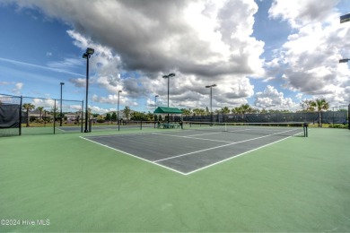 This impeccably maintained home, spanning over 2,900 square feet on Compass Pointe Golf Course in North Carolina - for sale on GolfHomes.com, golf home, golf lot