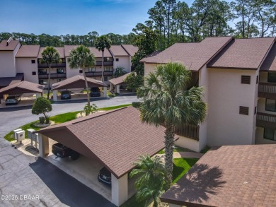 This 3 bedroom 2 bath end corner unit is nestled on the top on Indigo Lakes Golf Club in Florida - for sale on GolfHomes.com, golf home, golf lot
