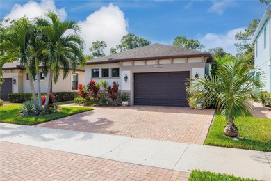 Discover effortless Florida living in your updated modern style on The Saints At Port St Lucie Golf Course in Florida - for sale on GolfHomes.com, golf home, golf lot