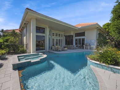 THIS GRACIOUS CUSTOM HOME HAS A GOLF MEMBERSHIP, GOLF AND LAKE on BallenIsles Golf and Country Club in Florida - for sale on GolfHomes.com, golf home, golf lot