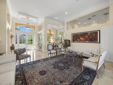 THIS GRACIOUS CUSTOM HOME HAS A GOLF MEMBERSHIP, GOLF AND LAKE on BallenIsles Golf and Country Club in Florida - for sale on GolfHomes.com, golf home, golf lot