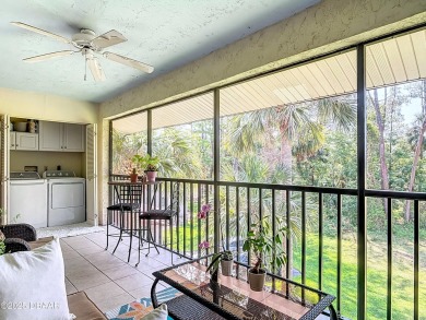 This 3 bedroom 2 bath end corner unit is nestled on the top on Indigo Lakes Golf Club in Florida - for sale on GolfHomes.com, golf home, golf lot