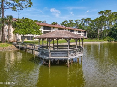 This 3 bedroom 2 bath end corner unit is nestled on the top on Indigo Lakes Golf Club in Florida - for sale on GolfHomes.com, golf home, golf lot
