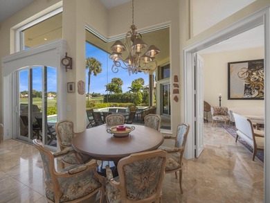 THIS GRACIOUS CUSTOM HOME HAS A GOLF MEMBERSHIP, GOLF AND LAKE on BallenIsles Golf and Country Club in Florida - for sale on GolfHomes.com, golf home, golf lot