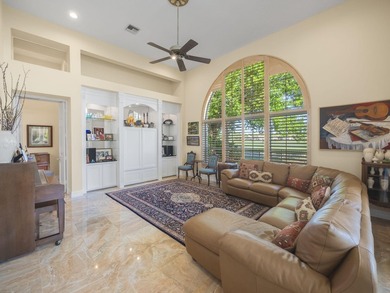 THIS GRACIOUS CUSTOM HOME HAS A GOLF MEMBERSHIP, GOLF AND LAKE on BallenIsles Golf and Country Club in Florida - for sale on GolfHomes.com, golf home, golf lot