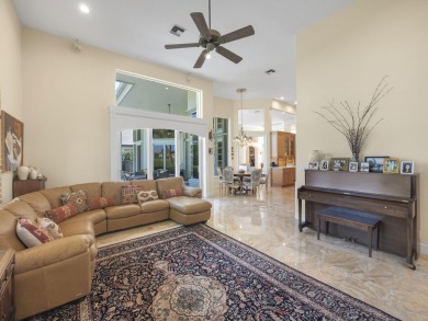 THIS GRACIOUS CUSTOM HOME HAS A GOLF MEMBERSHIP, GOLF AND LAKE on BallenIsles Golf and Country Club in Florida - for sale on GolfHomes.com, golf home, golf lot