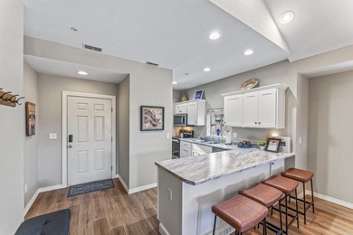Discover luxury living in this beautifully remodeled 2-bedroom on Ledgestone Country Club and Golf Course in Missouri - for sale on GolfHomes.com, golf home, golf lot