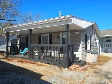 Ready to own a Cozy 2BR/2BA beach bungalow located within the on Prestwick Country Club in South Carolina - for sale on GolfHomes.com, golf home, golf lot