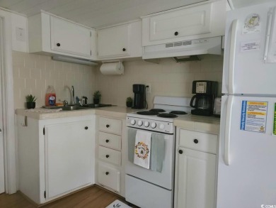 Ready to own a Cozy 2BR/2BA beach bungalow located within the on Prestwick Country Club in South Carolina - for sale on GolfHomes.com, golf home, golf lot