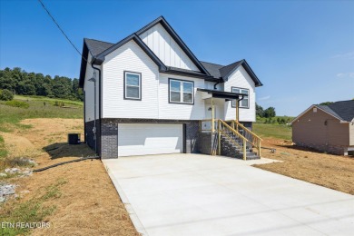Stunning 3-bedroom, 3-bathroom home in Jefferson City, just on Patriot Hills Golf Club in Tennessee - for sale on GolfHomes.com, golf home, golf lot