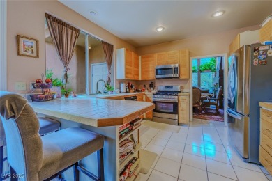 STUNNING WATERFRONT LOCATION. RARE END UNT FOR THIS MODEL WITH on Spanish Trail Golf and Country Club in Nevada - for sale on GolfHomes.com, golf home, golf lot