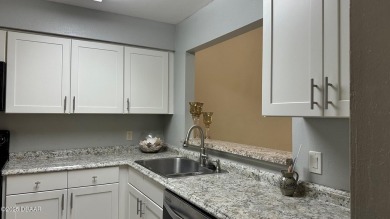 OWNER FINANCING  is available on this immaculate 2 bedroom one on The Club At Pelican Bay - North Course in Florida - for sale on GolfHomes.com, golf home, golf lot