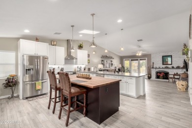 Beautifully remodeled four-bedroom home located on the 6th hole on Ahwatukee Country Club in Arizona - for sale on GolfHomes.com, golf home, golf lot