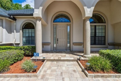 Stunning Amelia National home on a premier lot tucked into a on Amelia National Golf and Country Club in Florida - for sale on GolfHomes.com, golf home, golf lot