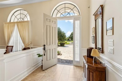 Stunning Amelia National home on a premier lot tucked into a on Amelia National Golf and Country Club in Florida - for sale on GolfHomes.com, golf home, golf lot