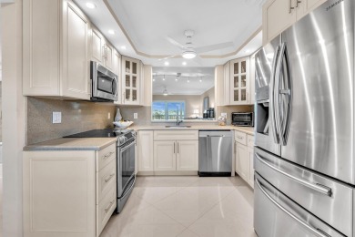 One-of-a-kind, turnkey 2 bed/2 bath END UNIT condo in the highly on Marina Lakes Golf Course in Florida - for sale on GolfHomes.com, golf home, golf lot