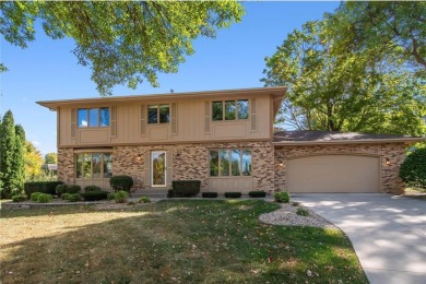 Classic and timeless, this quality built two-story home is on New Prague Golf Club in Minnesota - for sale on GolfHomes.com, golf home, golf lot