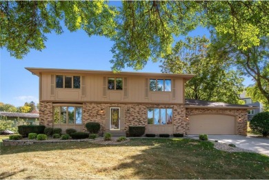 Classic and timeless, this quality built two-story home is on New Prague Golf Club in Minnesota - for sale on GolfHomes.com, golf home, golf lot