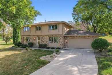 Classic and timeless, this quality built two-story home is on New Prague Golf Club in Minnesota - for sale on GolfHomes.com, golf home, golf lot