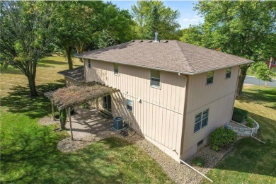 Classic and timeless, this quality built two-story home is on New Prague Golf Club in Minnesota - for sale on GolfHomes.com, golf home, golf lot