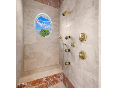Nestled behind a private gated entrance and situated on 2.88 on Tri Cities Golf Club in Tennessee - for sale on GolfHomes.com, golf home, golf lot