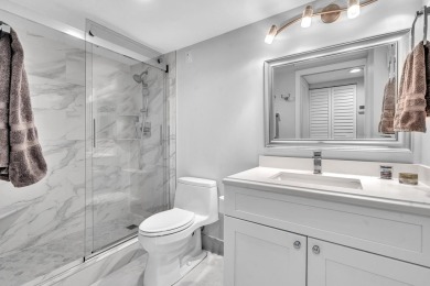 One-of-a-kind, turnkey 2 bed/2 bath END UNIT condo in the highly on Marina Lakes Golf Course in Florida - for sale on GolfHomes.com, golf home, golf lot