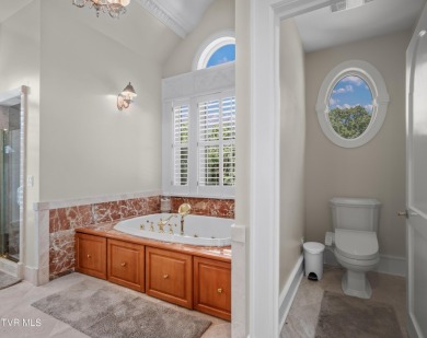 Nestled behind a private gated entrance and situated on 2.88 on Tri Cities Golf Club in Tennessee - for sale on GolfHomes.com, golf home, golf lot