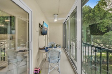 One-of-a-kind, turnkey 2 bed/2 bath END UNIT condo in the highly on Marina Lakes Golf Course in Florida - for sale on GolfHomes.com, golf home, golf lot