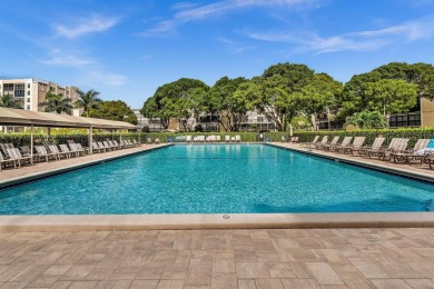 One-of-a-kind, turnkey 2 bed/2 bath END UNIT condo in the highly on Marina Lakes Golf Course in Florida - for sale on GolfHomes.com, golf home, golf lot