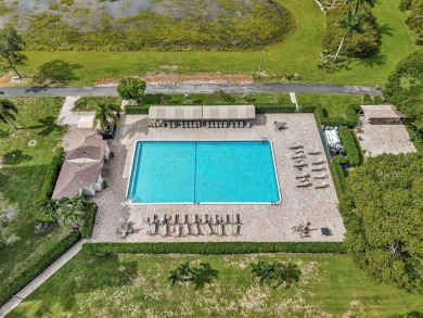 One-of-a-kind, turnkey 2 bed/2 bath END UNIT condo in the highly on Marina Lakes Golf Course in Florida - for sale on GolfHomes.com, golf home, golf lot
