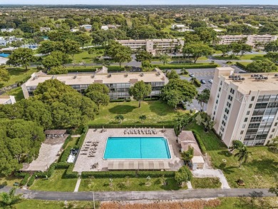 One-of-a-kind, turnkey 2 bed/2 bath END UNIT condo in the highly on Marina Lakes Golf Course in Florida - for sale on GolfHomes.com, golf home, golf lot