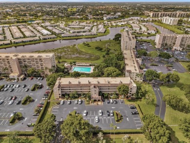 One-of-a-kind, turnkey 2 bed/2 bath END UNIT condo in the highly on Marina Lakes Golf Course in Florida - for sale on GolfHomes.com, golf home, golf lot