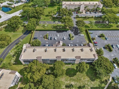 One-of-a-kind, turnkey 2 bed/2 bath END UNIT condo in the highly on Marina Lakes Golf Course in Florida - for sale on GolfHomes.com, golf home, golf lot