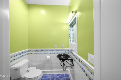 Nestled behind a private gated entrance and situated on 2.88 on Tri Cities Golf Club in Tennessee - for sale on GolfHomes.com, golf home, golf lot