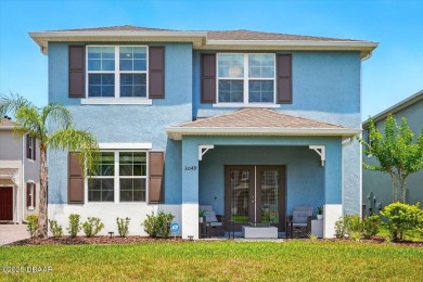 This stunning 2022 modern home in Venetian Bay is priced under on Venetian Bay Golf Course in Florida - for sale on GolfHomes.com, golf home, golf lot