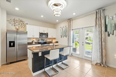 This stunning 2022 modern home in Venetian Bay is priced under on Venetian Bay Golf Course in Florida - for sale on GolfHomes.com, golf home, golf lot