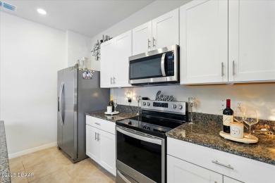 This stunning 2022 modern home in Venetian Bay is priced under on Venetian Bay Golf Course in Florida - for sale on GolfHomes.com, golf home, golf lot