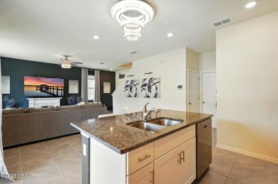 This stunning 2022 modern home in Venetian Bay is priced under on Venetian Bay Golf Course in Florida - for sale on GolfHomes.com, golf home, golf lot
