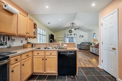 Stunningly kept 3 bedroom and 2 bathroom home in the beautiful on Heron Point Golf Club in South Carolina - for sale on GolfHomes.com, golf home, golf lot