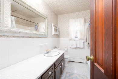 EDGEWATER CHARM IN NASSAU SHORES--THIS ONE'S HARD TO IGNORE! on Peninsula Golf Club in New York - for sale on GolfHomes.com, golf home, golf lot