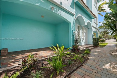 EXQUISITE, TRI-LEVEL FEE SIMPLE 3 BD/2.5 BA TOWNHOUSE, located on Hollywood Beach Golf and Country Club in Florida - for sale on GolfHomes.com, golf home, golf lot